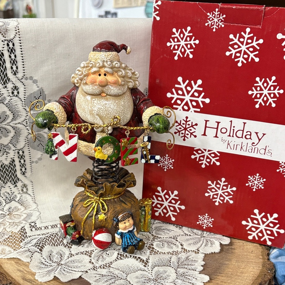 Kirklands Jolly Santa on a Spring Figurine